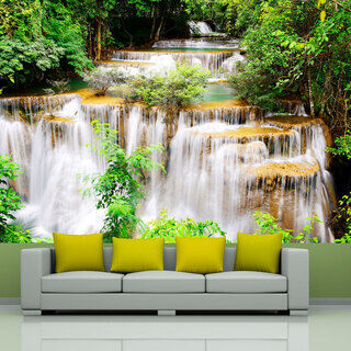 Fototapet - Naturens skönhet - landskap med vattenfall vid en flod omgiven av skog
