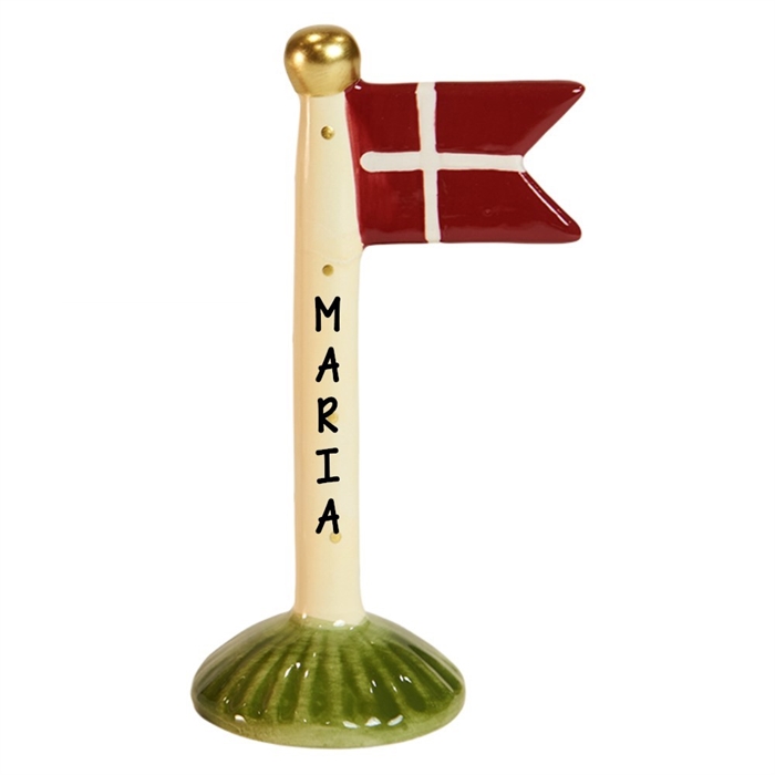 Röd flagga med vitt kors på grön bas. Gyllene boll på toppen. Texten "MARIA" på stången.