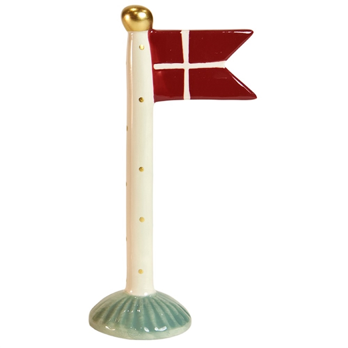 Röd flagga med vitt kors, guldprickar längs stången, guldboll på toppen, grön bas.