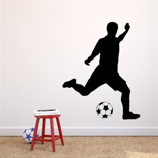 Wallstickers med fotbollsspelare som sparkar till en boll