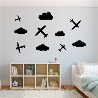 Dröm dig bort med denna wallstickers med Flygplan och moln